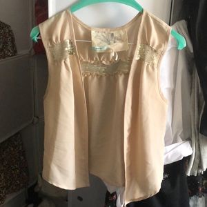 Never worn lightweight beautiful top vest sequins by Kimchie Blue.